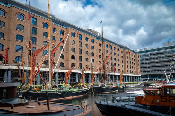 stock image Traditional Thames Sailing Barges lie moored within the preserved St Katharine Docks in London.