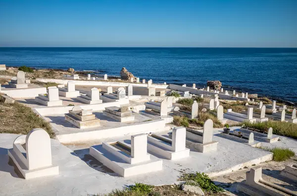 stock image Muslim graves next to the Mediterranean Sea at the ancient Mahdia Maritime Cemetery, Mahdia, Tunisia.