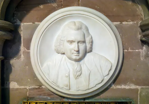 stock image A relief sculpture of Erasmus Darwin, the grandfather of naturalist Charles Darwin, in Lichfield Cathedral, Staffordshire, UK