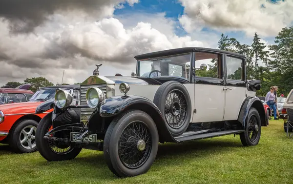 stock image A 1928 Rolls-Royce 20hp Park Ward Landaulette with chassis number GLY62 on display at a classic car show in Storrington, West Sussex, UK.