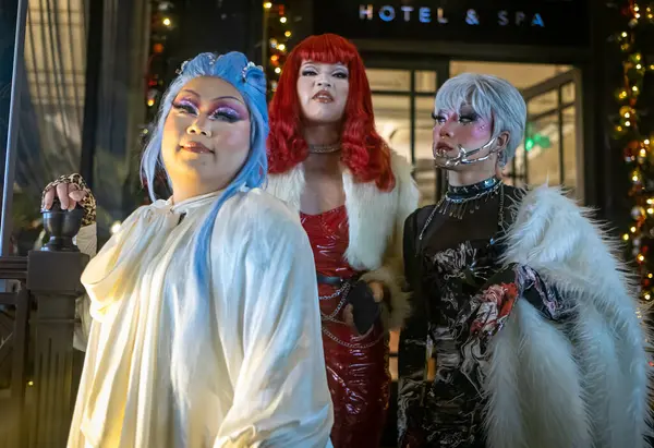 stock image Three drag queens pose on the steps of a hotel in central Hanoi, Vietnam.