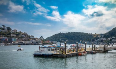 The Kingswear Ferry waits for passengers on the River Dart Estuary in Dartmouth, Devon, UK clipart