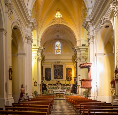 The interior of the beautiful baroque Mother Church of Saint Andrew the Apostle, or Chiesa Madre, in Presicce, Lecce Province, Apulia, Italy. clipart