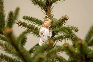 Noel süslemeleri, Noel ağacında duran melek.