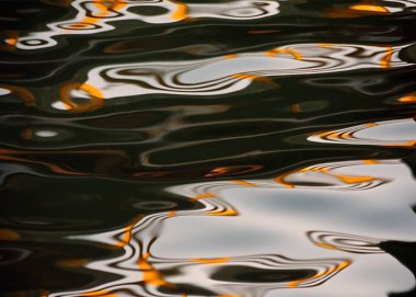 A riot of magnificent colors reflected in the stream...
