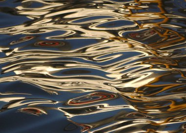 Fluctuating; Blue, brown, cream, grey colors...