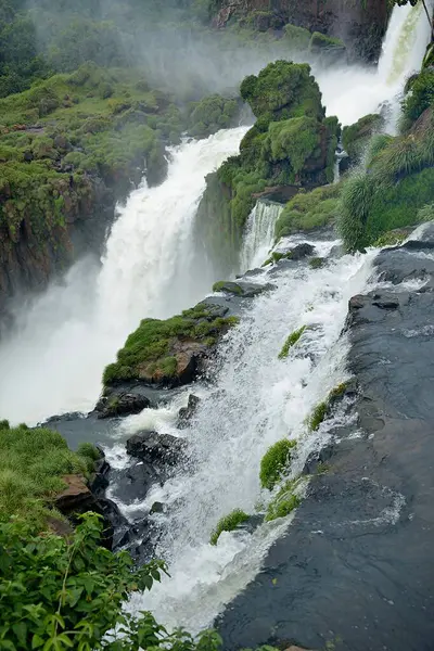 stock image Iguaz Falls: are waterfalls of the Iguazu River on the border of the Argentine province of Misiones and the Brazilian state of Paran.The falls divide the river into the upper and lower Iguazu