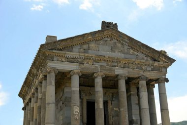 ARMENIA Greco-Roman Temple of Garni, Built in Ionic style and located in the village of Garni. Built by King Tiridates I in the 1st century AD. in honor of the sun god Mihr clipart