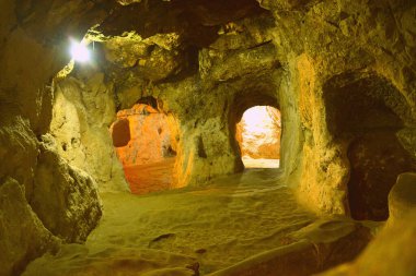 TURKEY,DERINKUYU The mysterious underground city dates back to the 8th-7th century BC. it extends 85 m deep on eight different levels and could accommodate a population of 20,000 people clipart