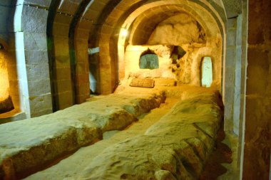 TURKEY,DERINKUYU The mysterious underground city dates back to the 8th-7th century BC. it extends 85 m deep on eight different levels and could accommodate a population of 20,000 people clipart