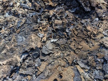 Yanmış atıklardan elde edilen kül dokusu.