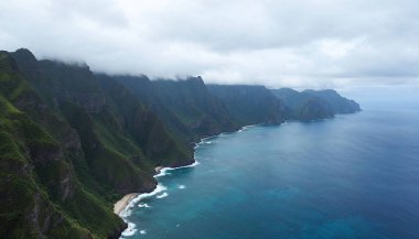 Magnificent panoramic aerial view of the entire island of UA HUKA by setting sun