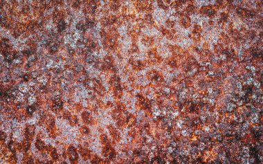 Araba vucüdunda pas, paslı metal yaprak dokusunun aşırı görüntüsü..