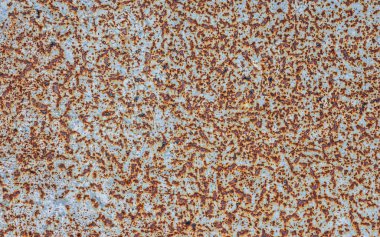 Metal bir levhanın paslı yüzeyi, paslı metal dokusu ve oksitlenmiş metal zemin.