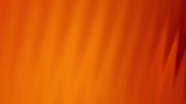 Yumuşak, bulanık dikey çizgileri olan parlak koyu turuncu bir arka plan. Web sitesi afişleri, sosyal medya grafikleri ve soyut tasarım projeleri için ideal.