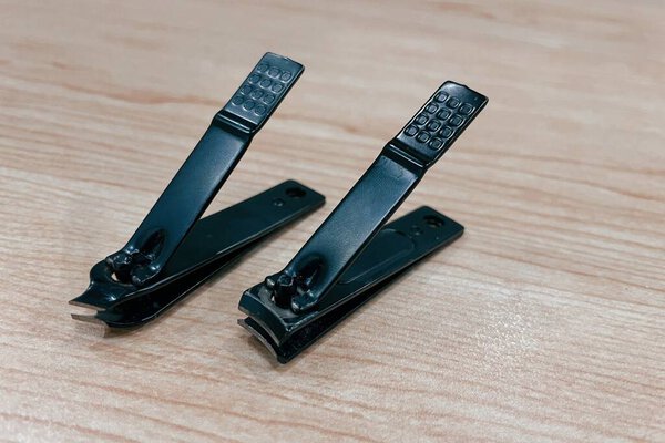 tools for nail care on a wooden table, can be used by anyone
