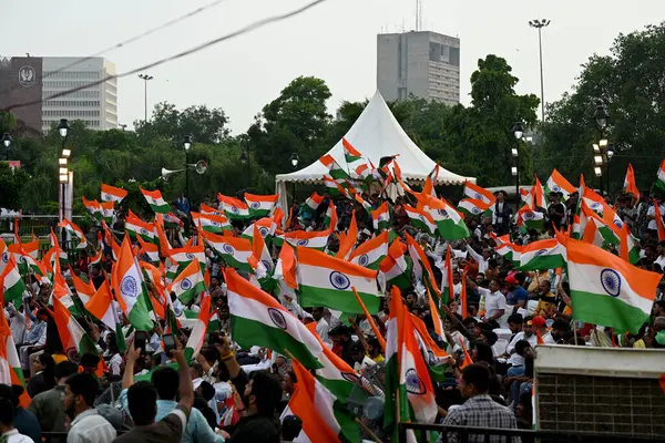 stock image NEW DELHI, INDIA - JULY 25, 2024: People during BJP National President JP Nadda attended Mashal Rally on the eve of Kargil Vijay Diwas, in honour of Brave Martyrs, at Central Park Connaught Place on July 25, 2024 in New Delhi, India.