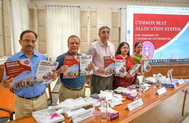 NEW DELHI, INDIA - MAY 28: Vikas Gupta, Registrar of Delhi University along with other DU officials addresses a press conference for the Admission process for the academic year 2024 -2025 along with the launch of Admission Brochure at VC Office clipart