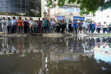 NEW DELHI, INDIA - JULY 28: Students protesting at karol Bagh after 3 students died last night, as waterlogged in basement of coaching center in Saturday evening rain, on July 28, 2024 in New Delhi, India. Delhi's IAS coaching center on Saturday  clipart