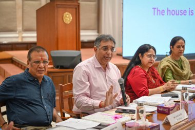 NEW DELHI, INDIA - MAY 28: Vikas Gupta, Registrar of Delhi University along with other DU officials addresses a press conference for the Admission process for the academic year 2024 -2025 along with the launch of Admission Brochure at VC Office clipart