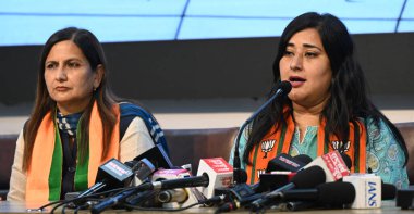 NEW DELHI, INDIA - MAY 13, 2024: BJP West Delhi Lok Sabha Candidate Kamaljeet Sehrawat   and BJP candidate for New Delhi Lok Sabha seat Bansuri Swaraj addressing Press Conference at Delhi BJP Office on May 13, 2024 in New Delhi, India. clipart