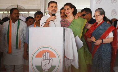 RAE BARELI, INDIA - MAY 17, 2024: Congress leader and Candidate from Raebareli Lok Sabha seat Rahul Gandhi his mother and ex-Congress chief Sonia Gandhi, and sister and party General Secretary Priyanka Gandhi Vadra during a Public meeting clipart