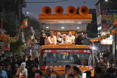 NEW DELHI, INDIA - MAY 21: Rajnath Singh, Union Minister for the Ministry of Defence conducts a roadshow as a part of Election campaign for the BJP Candidate from North West Delhi Constituency, Yogender Chandolia for upcoming Loksabha Elections 2024  clipart