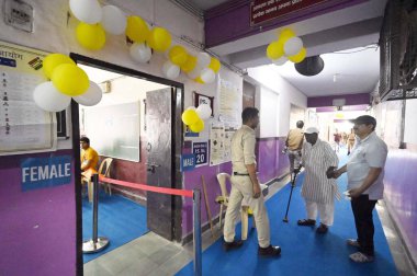 People seen inside a polling booth to cast their vote in the sixth round of polling at smart both at Kendriya Vidyalaya Pushp Vihar Sector-3, on May 25, 2024 in New Delhi, India.  clipart