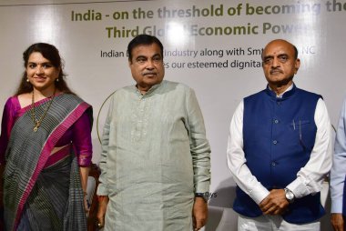 MUMBAI, INDIA - MAY 18, 2024: Union Minister for Road Transport and Highways Nitin Gadkari addressing during India - The Threshold of becoming the Third Global Economic Power initiative by Indian Diamond industry along with Shaina NC. clipart