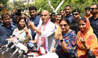 LUCKNOW, INDIA - MAY 20: Defence Minister of India and BJP Candidate from Lucknow Lok Sabha seat Rajnath Singh shows his inked fingers after casting his vote at Scholar home polling station Gomti Nagar during the fifth phase of Lok Sabha Election  clipart