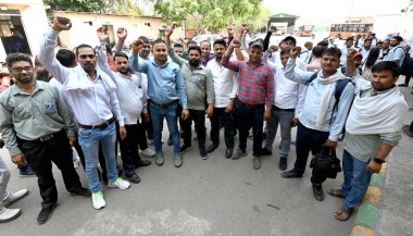 Cluster DTC Bus Staff Employees protest at Rajghat depot as they were fired after working for 10 years on May 24, 2024 in New Delhi, India.  clipart