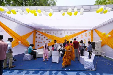 People seen inside a polling booth to cast their vote in the sixth round of polling at smart both at Kendriya Vidyalaya Pushp Vihar Sector-3, on May 25, 2024 in New Delhi, India.  clipart