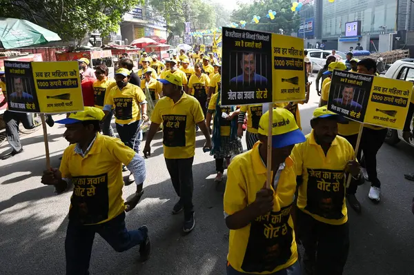 stock image NEW DELHI, INDIA - MAY 5, 2024: Supporters during AAP (Aam Aadmi Party) Rajya Sabha MP Sanjay Singh, Delhi President Gopal Rai, Saurabh Bharadwaj, Lok Sabha Candidate Somnath Bharti, Mayor Shelly Oberoi participate in Walkathon event 