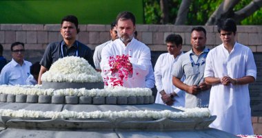 NEW DELHI, INDIA - MAY 21: Congress Leader Rahul Gandhi with Raihan Vadra paying tribute to former Prime Minister Rajiv Gandhi, during the Ceremony of Remembrance to mark the 33rd Anniversary of the Martyrdom of Rajiv Gandhi at Vir Bhumi, Rajghat on  clipart