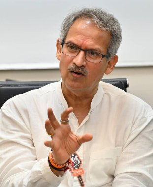 MUMBAI, INDIA - MAY 13: Anil Desai, Shiv Sena (UBT) candidate from Mumbai South Central during his interview at HT office on May 13, 2024 in Mumbai, India. clipart