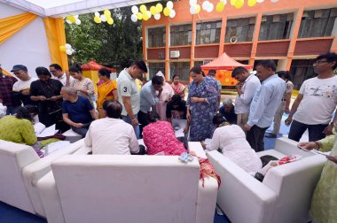 People seen inside a polling booth to cast their vote in the sixth round of polling at smart both at Kendriya Vidyalaya Pushp Vihar Sector-3, on May 25, 2024 in New Delhi, India.  clipart