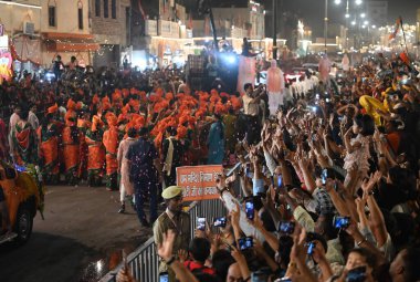 LUCKNOW, INDIA - MAY 5, 2024: Prime Minister Narendra Modi during the road show in Ayodhya in support of BJP candidate Lallu Singh from Faizabad (Ayodhya) parliamentary seat, UP CM Yogi Adityanath also present in road show at Rampath  clipart