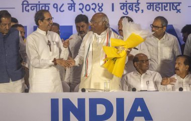 MUMBAI, INDIA - MAY 18: Shiv Sena (UBT) chief Uddhav Thackeray, Congress President Mallikarjun Kharge and NCP Chief Sharad Pawar interact with media during the press conference of Maha Vikas Aghadi (MVA) at Grand Hyatt, on May 18, 2024 in Mumbai clipart