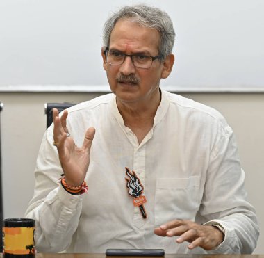 MUMBAI, INDIA - MAY 13: Anil Desai, Shiv Sena (UBT) candidate from Mumbai South Central during his interview at HT office on May 13, 2024 in Mumbai, India. clipart