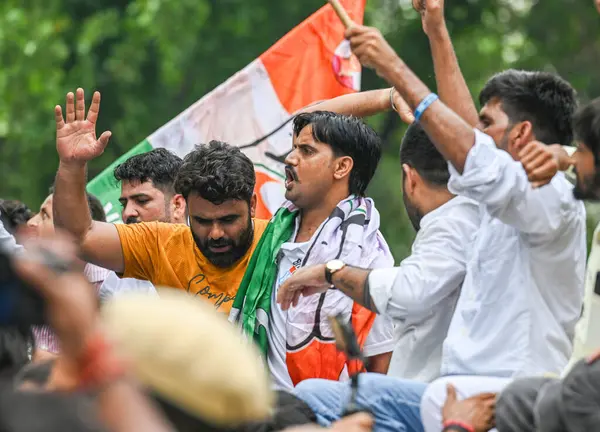 stock image NEW DELHI, INDIA - JULY 26, 2024: Members of Indian Youth Congress protesting against Central Govt's Kursi Bachao Budget at outside the Shastri Bhawan, at Dr. Rajendra Prasad Road on July 26, 2024 in New Delhi, India. 