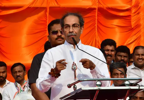 stock image MUMBAI, INDIA - MAY 18, 2024: Shiv Sena (UBT) chief Uddhav Thackeray, Shiv Sena (UBT) South Mumbai candidate Arvind Sawant, along with other party leaders addressing during the public meeting at Kalachowki, on May 18, 2024 in Mumbai, India