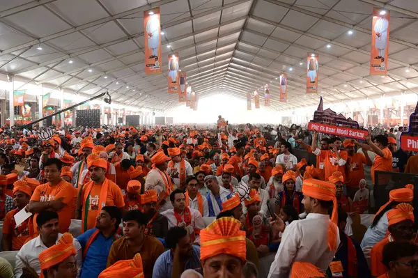 stock image NEW DELHI, INDIA - MAY 22, 2024: BJP supporters during an election rally of Prime Minister Narendra Modi in Dwarka for the BJP Lok Sabha candidates, on May 22, 2024 in New Delhi, India. 