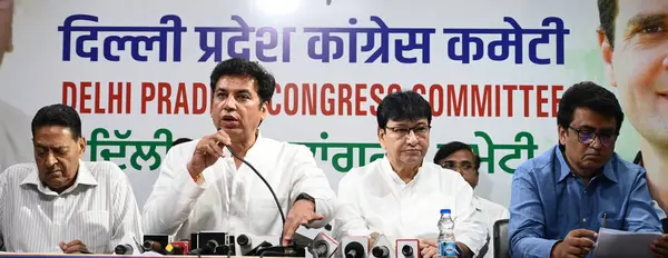 stock image NEW DELHI, INDIA - MAY 13: DPCC President Devender Yadav along with Former President DPCC Subhash Chopra, Former Delhi Ministet Harun Yusuf, Former DPCC President Ch Anil Kumar, Ragini Nayak, Amrita Dhawan, and others addressing media persons 