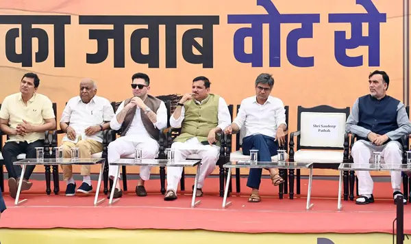 stock image NEW DELHI, INDIA - MAY 19, 2024: Rajya Sabha MPs Sanjay Singh, Raghav Chadha, Delhi ministers Suarabh Bhardwaj, Gopal Rai during a protest march to BJP HQ at DDU Marg by AAP senior leaders from AAP Party HQ