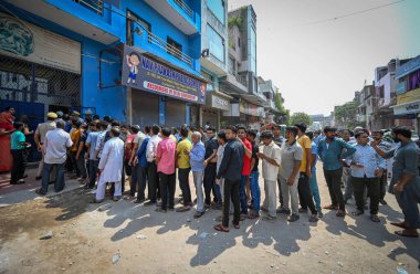 Voters seen standing in queues to cast their vote during the sixth phase of Loksabha Elections at a polling station at Rajiv Nagar on May 25, 2024 in New Delhi, India. clipart