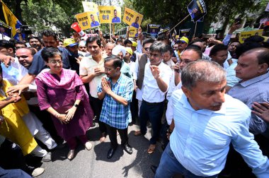 NEW DELHI, INDIA - MAY 19: Delhi Chief Minister Arvind Kejriwal, along with Rajya Sabha MPs Sanjay Singh, Raghav Chadha, Delhi ministers Suarabh Bhardwaj, Gopal Rai led a protest march towards BJP HQ against the arresting of AAP  clipart