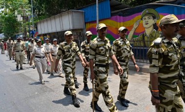 MUMBAI, INDIA - MAY 18, 2024: Police personnel of JJ Marg Police Station do a Route March in their jurisdiction, ahead of upcoming Lok Sabha election 2024, Imamwada, on May 18, 2024 in Mumbai, India. clipart