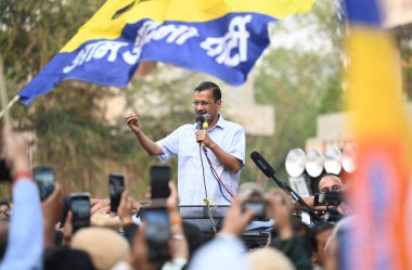 NEW DELHI, INDIA - MAY 15 2024:  Delhi CM Arvind Kejriwal seen during road show as a part of the election campaign for INDIA Alliance Candidate of Congress, JP Aggarwal from Chandni Chowk Constituency for upcoming Loksabha Elections at GT Karnal Road clipart