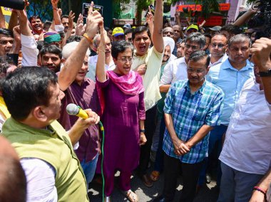 NEW DELHI, INDIA - MAY 19, 2024: Delhi CM Arvind Kejriwal, Delhi Ministers Saurabh Bharadwaj, Rajya Sabha MP Sanjay Singh, Raghav Chaddha and party workers led a protest march to BJP HQ at DDU Marg by AAP senior leaders from AAP Party HQ clipart