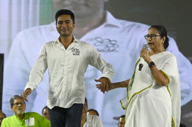 KOLKATA, INDIA - MAY 29, 2024: Chief Minister of West Bengal Mamata Banerjee campaigns in support of TMC MP and candidate for Diamond Harbour constituency Abhishek Banerjee in a public rally ahead of last phase of Lok Sabha Election 2024  clipart